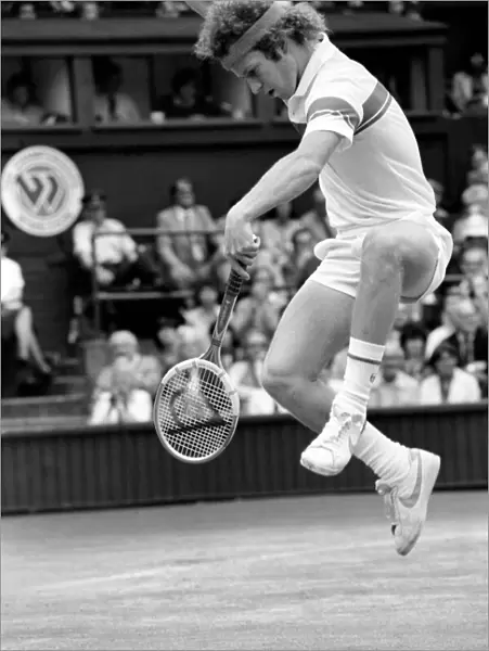 Sport: Tennis. John McEnroe gets an tied up in his Centre Court Wining Wimbledon Semi
