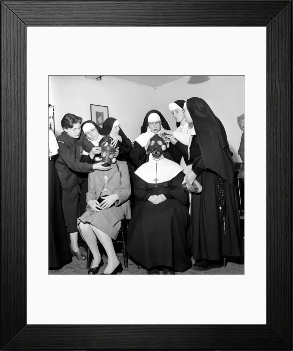 Framed Print : The Nuns at the Convent of Santa Maria Luton, have formed their own civil defence group