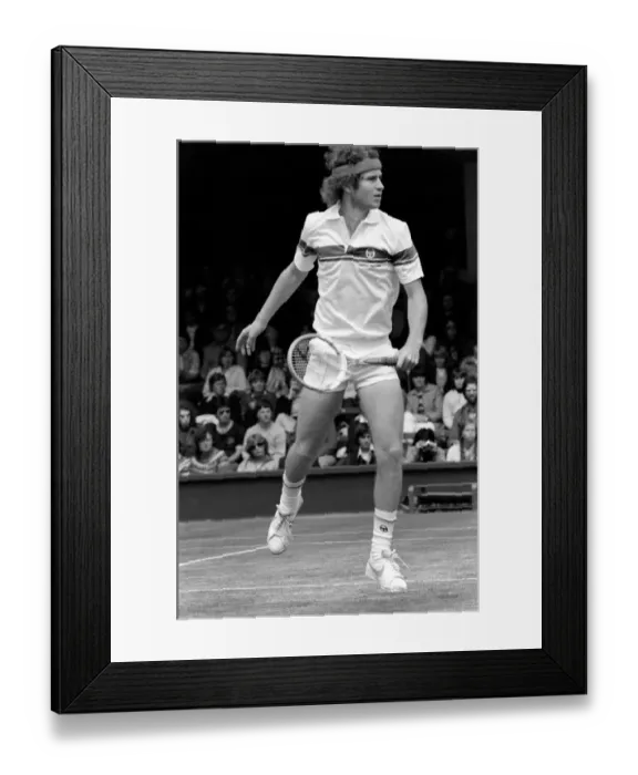 Framed Print : Wimbledon 6th Day: McEnroe v. Stan Smith. Centre Court - McEnroe in action today