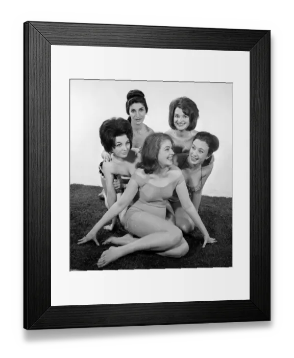 Framed Print : Fashion shoot for models wearing swimsuits. They are left to right: Delia Smith