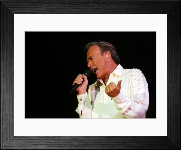 Framed Print : Neil Diamond entertains the crowd at the Telewest Arena last night