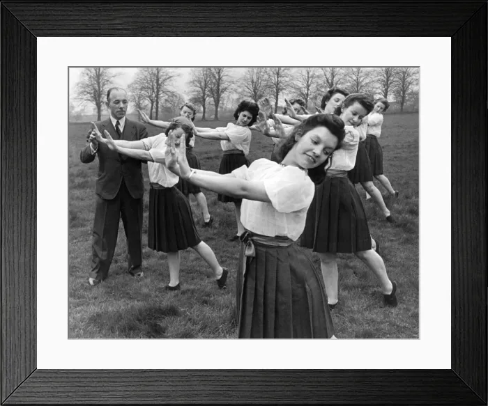 Framed Print : Girls from the Czech youth movement Sokol in Britain, performing fitness exercises in