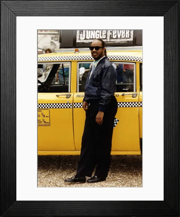 Framed Print : Stevie Wonder Singer arrives at his press conference in an New York yellow cab Framed Print : Stevie Wonder Singer arrives at his press conference in an New York yellow cab