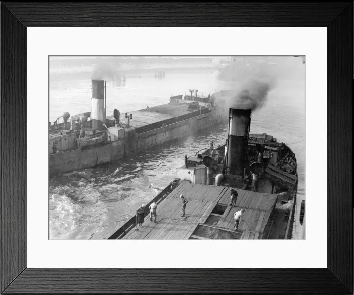 Framed Print : The collier ship Fulham II moves down the River Tyne at Dunston Staithes passing another Framed Print : The collier ship Fulham II moves down the River Tyne at Dunston Staithes passing another