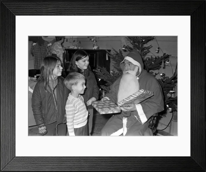 Framed Print : Claybrooke christmas fayre at the village hall. Shirley & Joy Rathbone with Santa