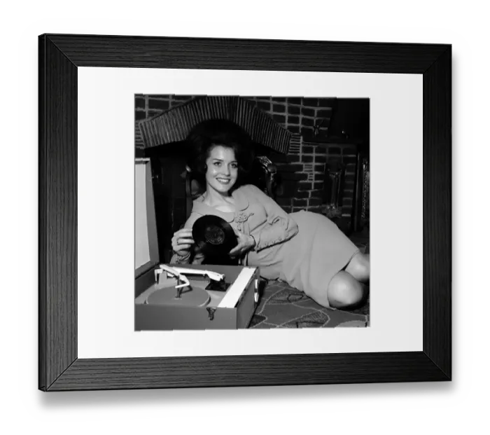 Framed Print : Julie Rogers April 1964 Singer pictured at home with her new record Framed Print : Julie Rogers April 1964 Singer pictured at home with her new record
