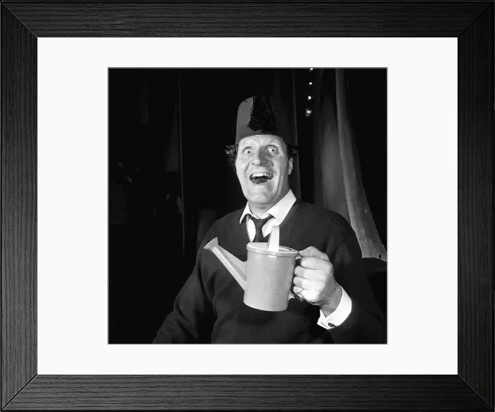 Framed Print : Tommy Cooper June 1965 comedian wearing fez hat holding watering can