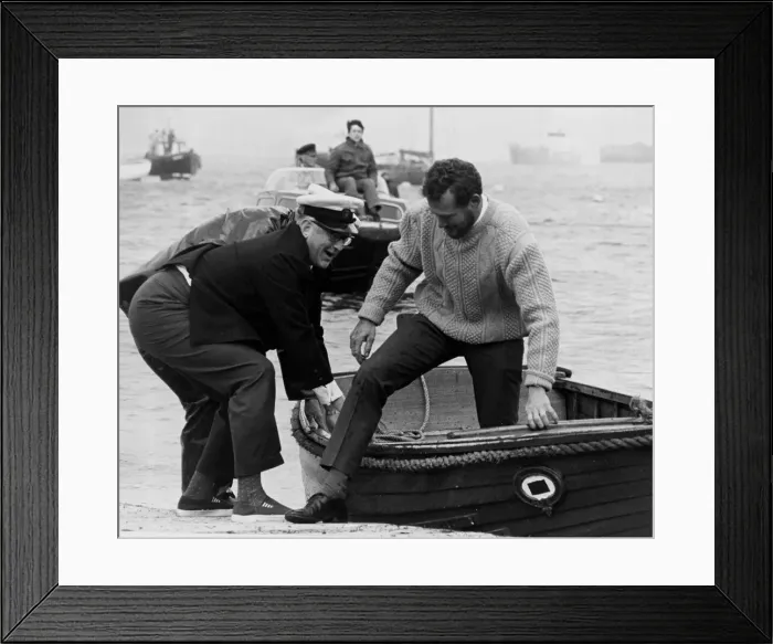 Framed Print : Robin Knox Johnston is helped on to dry land after winning the 1968-69 Sunday Times Framed Print : Robin Knox Johnston is helped on to dry land after winning the 1968-69 Sunday Times