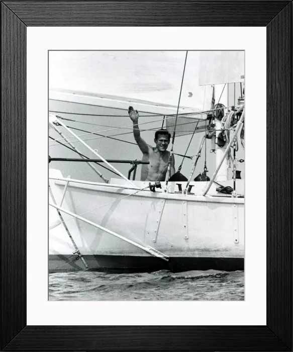 Framed Print : Robin Knox Johnston waves to his parents from his Suhaili boat at Falmouth before his Framed Print : Robin Knox Johnston waves to his parents from his Suhaili boat at Falmouth before his
