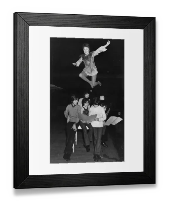 Framed Print : Members of the cast study their lines as Lulu flies high. December 1972 P035536 Framed Print : Members of the cast study their lines as Lulu flies high. December 1972 P035536