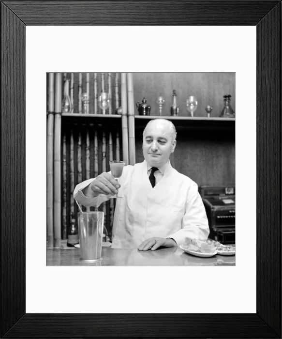 Framed Print : Drinks: Cocktails Joe Gilmore top barman at the Savoy hotel in London seen here preparing