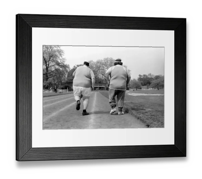 Framed Print : Jogger-nauts: John Robinson sports writer with Colin Taylor jogging in Battersea Park Framed Print : Jogger-nauts: John Robinson sports writer with Colin Taylor jogging in Battersea Park