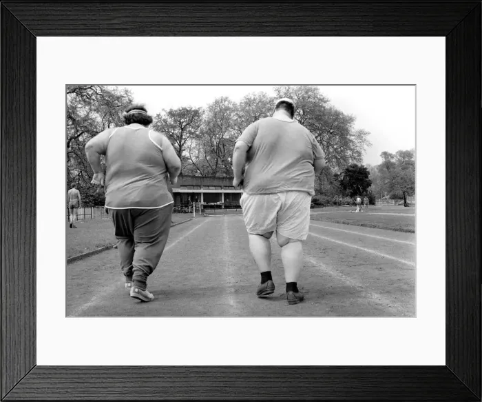 Framed Print : Jogger-nauts: John Robinson sports writer with Colin Taylor jogging in Battersea Park Framed Print : Jogger-nauts: John Robinson sports writer with Colin Taylor jogging in Battersea Park