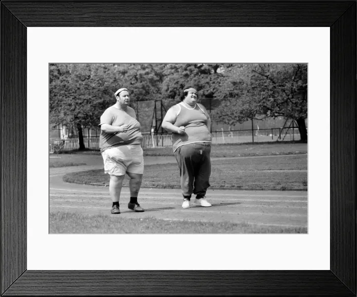 Framed Print : Jogger-nauts: John Robinson sports writer with Colin Taylor jogging in Battersea Park Framed Print : Jogger-nauts: John Robinson sports writer with Colin Taylor jogging in Battersea Park