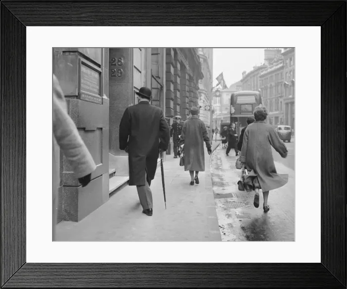 Framed Print : A city banker seen here arriving at his office at the Bank of New South Wales in the city Framed Print : A city banker seen here arriving at his office at the Bank of New South Wales in the city