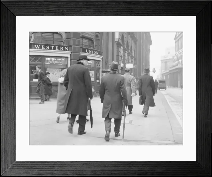Framed Print : Stockbroker wearing a bowler hat seen here making his way to the Stock Exchange Circa Framed Print : Stockbroker wearing a bowler hat seen here making his way to the Stock Exchange Circa