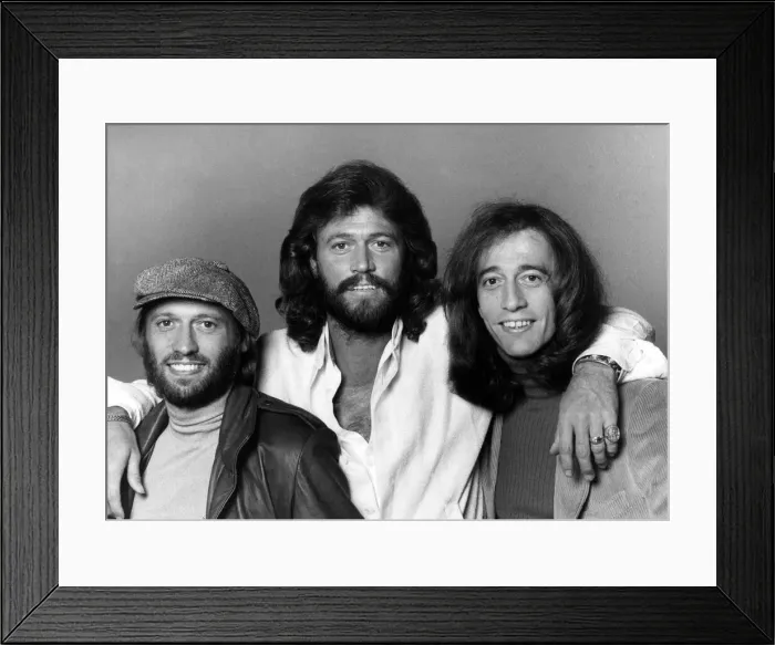 Framed Print : The Bee Gees pop group. The three Gibb brothers left to right: Maurice Framed Print : The Bee Gees pop group. The three Gibb brothers left to right: Maurice