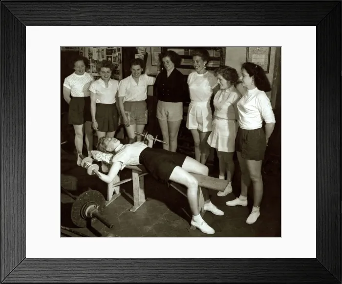 Framed Print : Women Exercising - July 1954 Stretching weight lifting