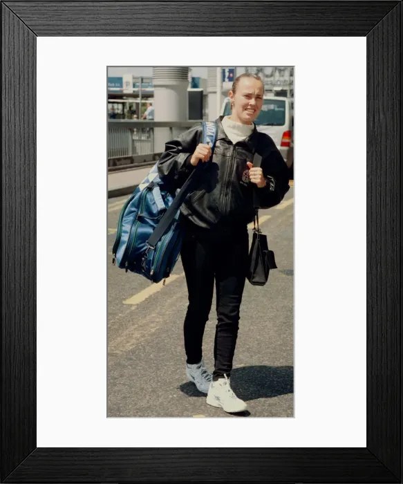 Framed Print : Tennis player Martina Hingis leaves Heathow Airport for Switzerland after losing her Framed Print : Tennis player Martina Hingis leaves Heathow Airport for Switzerland after losing her