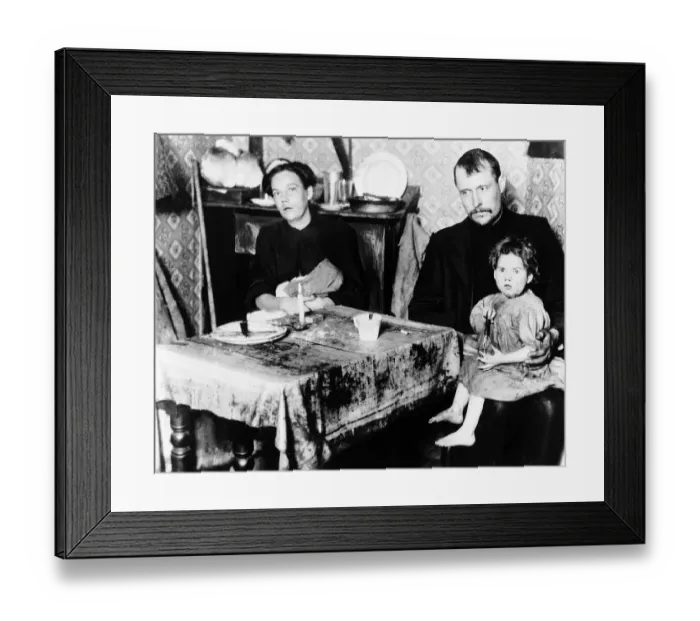 Framed Print : Family living in the slums of East London December 1910