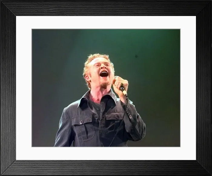 Framed Print : Mick Hucknall of Simply Red performing at Warwick Castle. August 1999