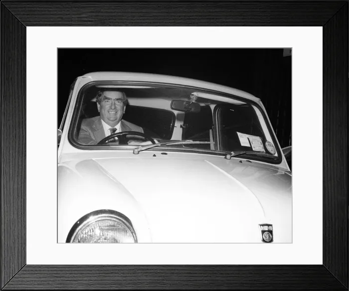 Framed Print : Dennis Healey MP driving in his Mini car October 1980 Framed Print : Dennis Healey MP driving in his Mini car October 1980