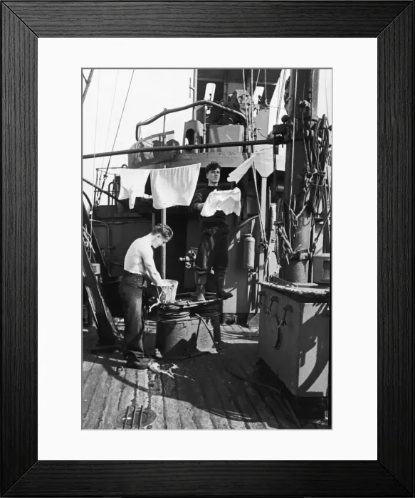 Framed Print : Two of the crew of a Royal Navy minesweeper on coastal convoy duties off the south west Framed Print : Two of the crew of a Royal Navy minesweeper on coastal convoy duties off the south west