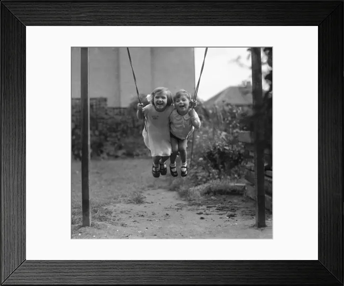Framed Print : Betty Graves and Keith having fun on a back garden swing Alfieri. 1277 Framed Print : Betty Graves and Keith having fun on a back garden swing Alfieri. 1277