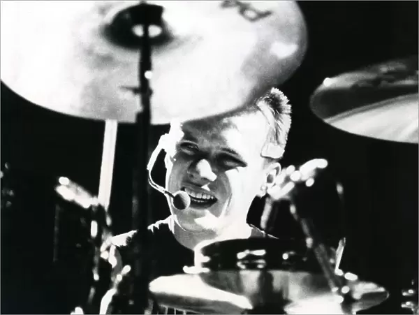 Larry Mullen jnr. playing the drums with U2 at the N. E. C. Birmingham
