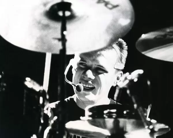 Larry Mullen jnr. playing the drums with U2 at the N. E. C. Birmingham