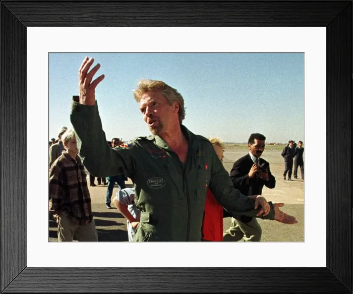 Framed Print : Richard Branson British tycoon gestures as he arrives at a Moroccan airbase after Framed Print : Richard Branson British tycoon gestures as he arrives at a Moroccan airbase after