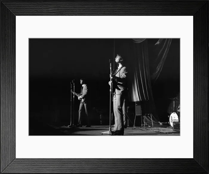 Framed Print : John Lennon and Paul McCartney onstage, during a Beatles gig at the Odeon Cinema Framed Print : John Lennon and Paul McCartney onstage, during a Beatles gig at the Odeon Cinema