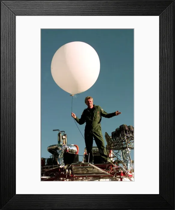 Framed Print : Richard Branson on top of his Balloon capsule December 1997 with a small weather test Framed Print : Richard Branson on top of his Balloon capsule December 1997 with a small weather test