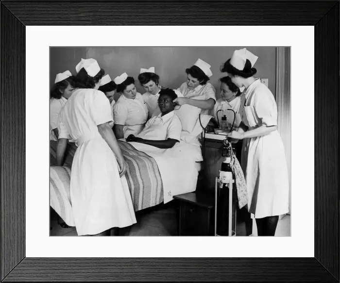 Framed Print : State hospital nurses learning how to administer oxygen by spectable frames