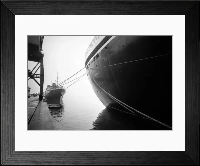 Framed Print : The bow of the famous ocean liner QE2 tied up at the psenger terminal at Southampton Framed Print : The bow of the famous ocean liner QE2 tied up at the psenger terminal at Southampton
