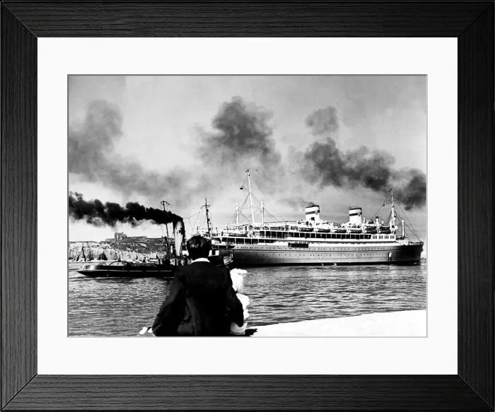 Framed Print : The Polish Liner Batory is watched by a father and daughter as she is gently manoeuvred Framed Print : The Polish Liner Batory is watched by a father and daughter as she is gently manoeuvred