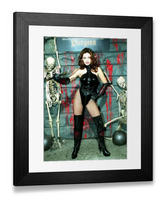 Framed Print : Cover girl Kelly Brook at the London Dungeon 1998 to help promote the new computer Framed Print : Cover girl Kelly Brook at the London Dungeon 1998 to help promote the new computer