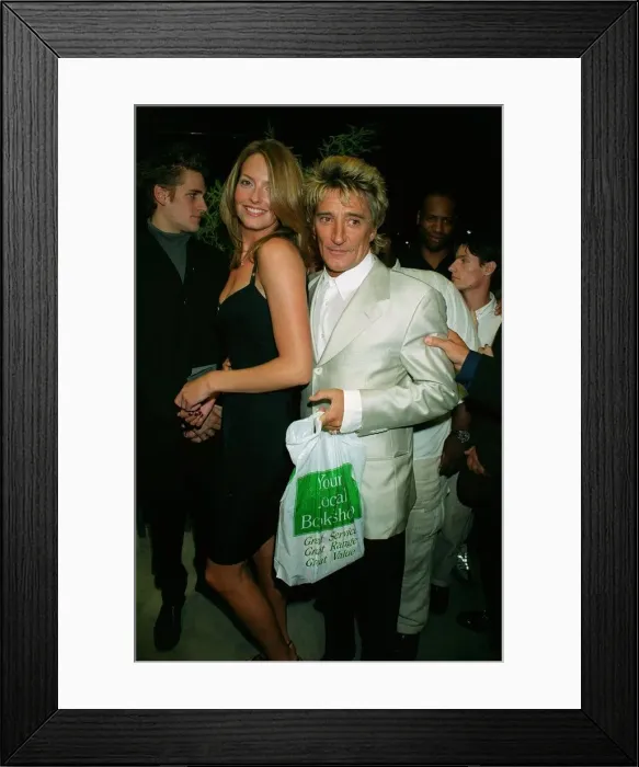 Framed Print : Rod Stewart with current girlfriend Sharon September 1999 at the opening of Framed Print : Rod Stewart with current girlfriend Sharon September 1999 at the opening of