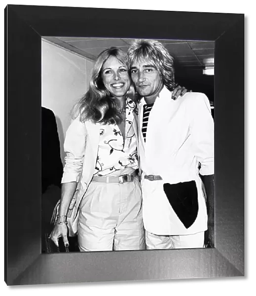 Rod Stewart Singer with girlfriend Alina at London Airport