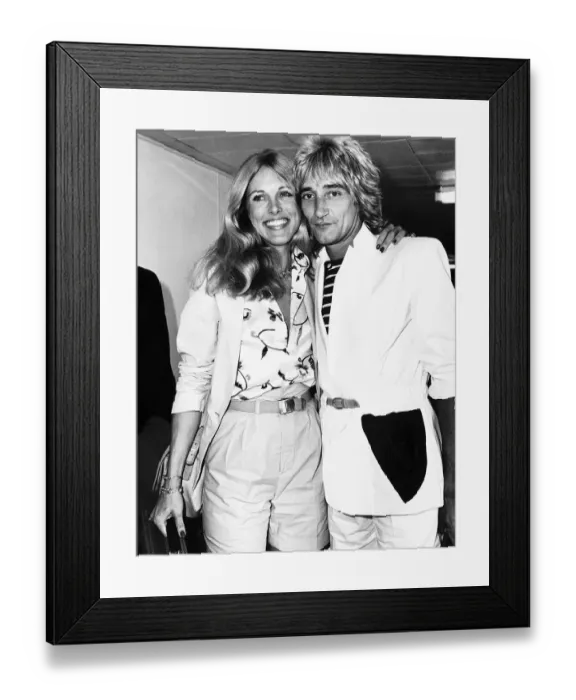 Framed Print : Rod Stewart Singer with girlfriend Alina at London Airport