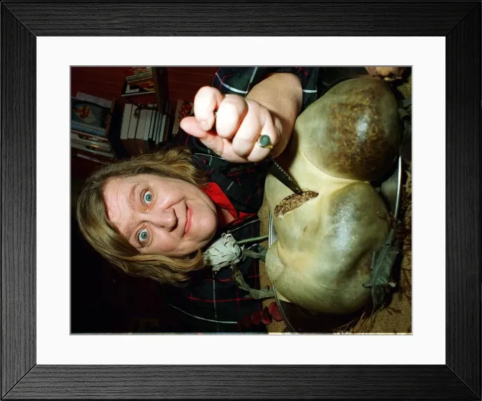 Framed Print : Clarissa Dickson Wright from Two Fat Ladies TV programme gets stuck into Haggis Framed Print : Clarissa Dickson Wright from Two Fat Ladies TV programme gets stuck into Haggis