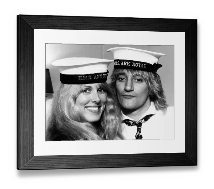 Framed Print : Rod Stewart singer with Alana Hamilton wearing Royal Navy HMS Ark Royal Caps during a Framed Print : Rod Stewart singer with Alana Hamilton wearing Royal Navy HMS Ark Royal Caps during a