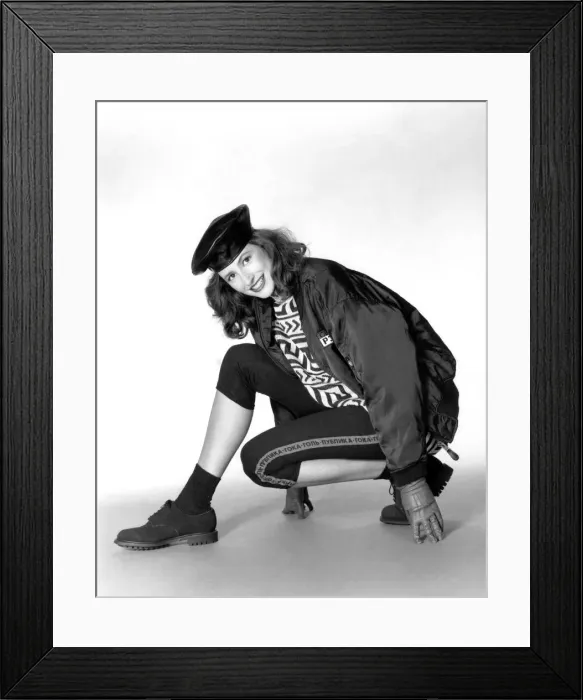 Framed Print : Crew-neck sweater, black pedal-pushers, black zip fronted jacket, black ankle socks Framed Print : Crew-neck sweater, black pedal-pushers, black zip fronted jacket, black ankle socks