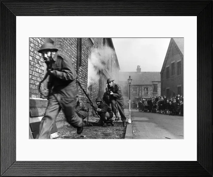 Framed Print : Members of the Home Guard running through a training exercise in a residential street in Framed Print : Members of the Home Guard running through a training exercise in a residential street in