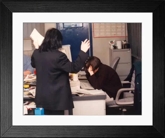 Framed Print : Pictures posed by models to illustrate bullying at work 01 / 06 / 95 circa Framed Print : Pictures posed by models to illustrate bullying at work 01 / 06 / 95 circa