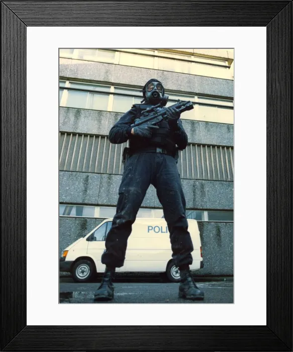 Framed Print : A police officer marksman in the latest high specification body armour and weapon Framed Print : A police officer marksman in the latest high specification body armour and weapon