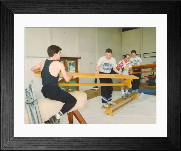 Framed Print : Trainee police officers are put through their paces - building a bridge to rescue an