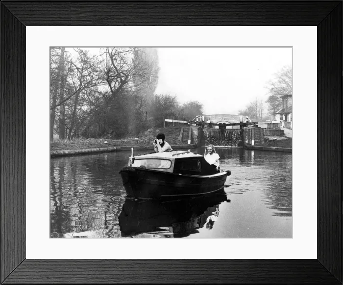 Framed Print : One of British Wateways two berth boat Water Baby'cabin cruisers on a canal Framed Print : One of British Wateways two berth boat Water Baby'cabin cruisers on a canal