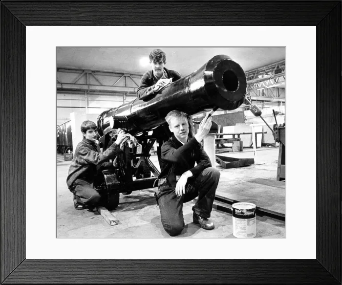 Framed Print : Putting the finishing touches to a repleca cannon are Graham War Framed Print : Putting the finishing touches to a repleca cannon are Graham War