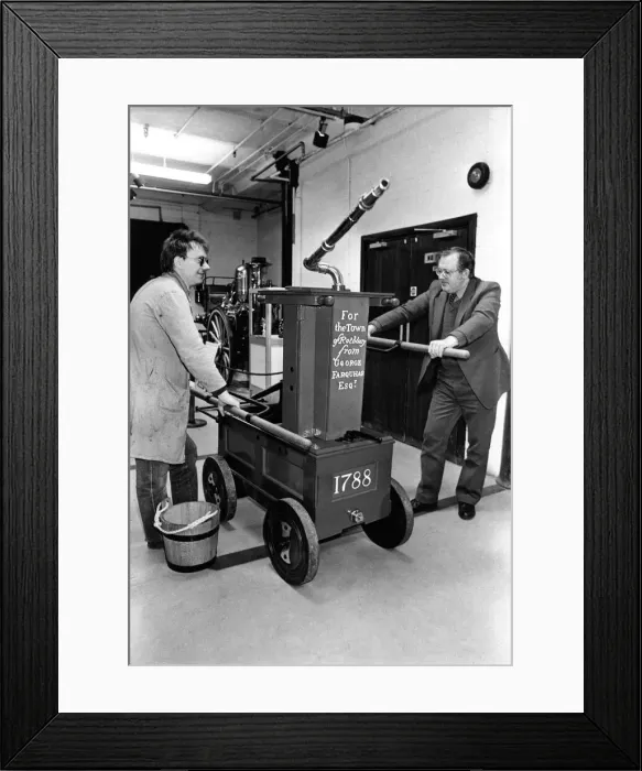 Framed Print : The restored Rothbury fire water pump with Ted Reay (left) and John Hallam Framed Print : The restored Rothbury fire water pump with Ted Reay (left) and John Hallam